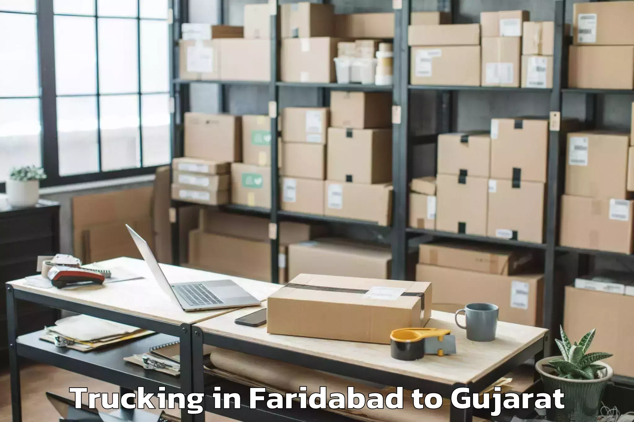 Quality Faridabad to Songadh Trucking